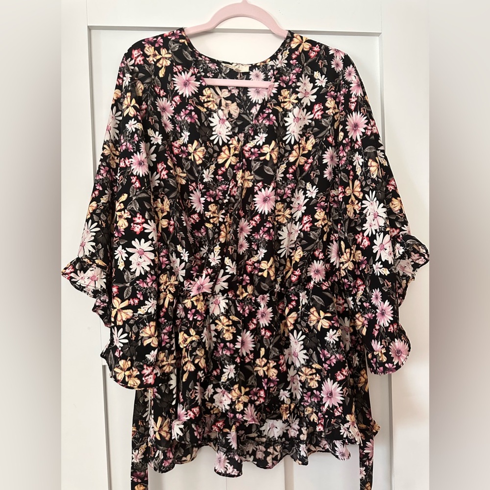 Multi colored blouse.   Ties in front.    Very cute!